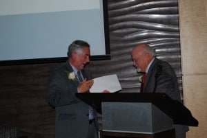 Jim Humphrey, company founder, honors Duke Shropp with recognition award