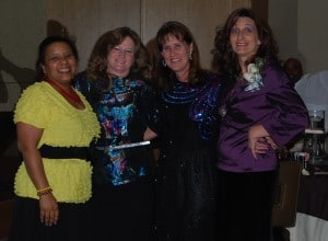 Executive Team members in their "80s" attire, (pictured left to right) Lori Clemons, Ginny Goodrich, Bethany Hooper, Sheri McGowan
