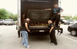 Team members from Cascades Village unload the truck at St. 